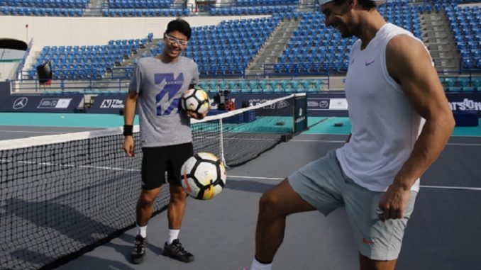Image 01 - World No.1 Rafael Nadal and MWTC challenger Hyeon Chung relax with friendly foot-tennis session ahead of potential semi-final clash in Abu Dhabi